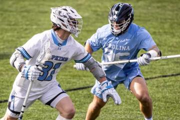 Men's lacrosse players during a game