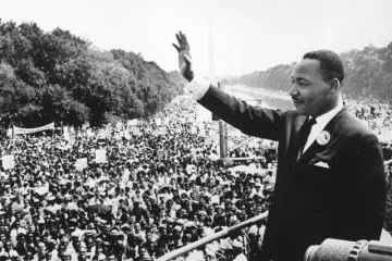 Black and white image of Martin Luther King Jr. at the National Mall in Washington, D.C.