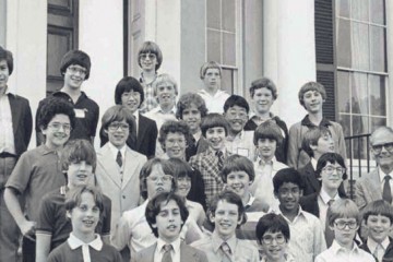 A black and white photo of a group of students on steps