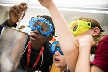 Students learn to measure calorie amounts in food while participating in a chemistry lab at CTY’s Baltimore site at Gilman School this summer.