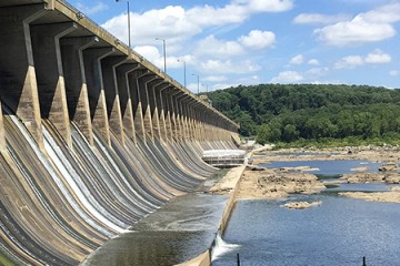 Spillway of the Conowingo Dam shows water filtering out from a large concrete structure