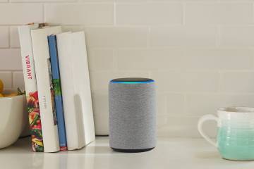 An Amazon Echo Plus with Alexa technology on a kitchen counter