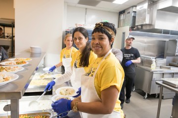 Women serve food