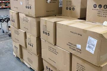 Boxes of face masks and shields