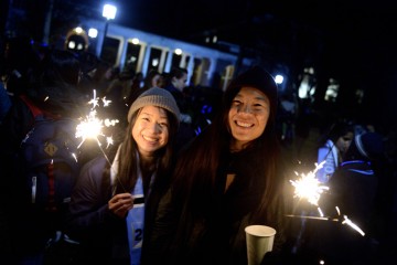 Students pose with sparklers