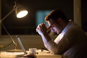 Distressed man experiencing burnout