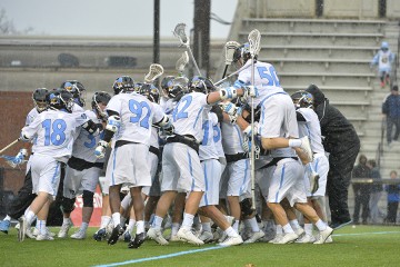 Players celebrate in a large group