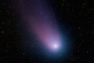 Comet flies across the sky