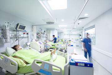 Patients and nurses in a hospital intensive care unit