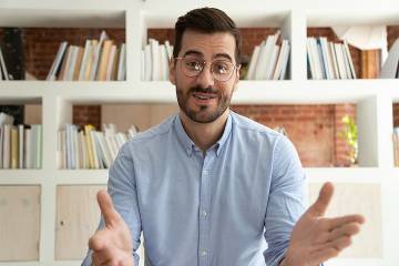 Man having conversation with unseen employee