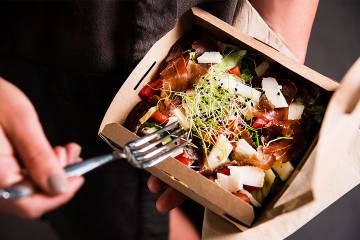 Close-up of to-go box holding healthy lunch