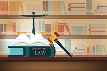 Illustration of law library with employment law book on table in the foreground