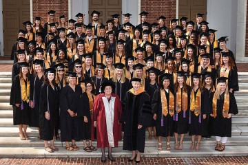 nursing graduates in their caps and gowns