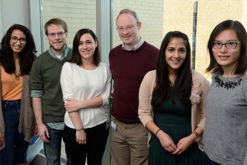 Johns Hopkins biologist Scott Bailey with his research team