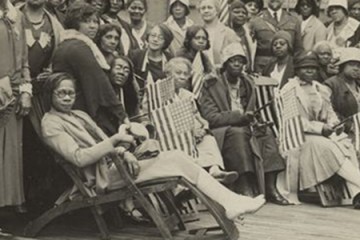 A crop image of a photo of African-American women aboard a ship in 1930
