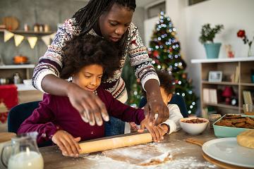 Woman baking with her children