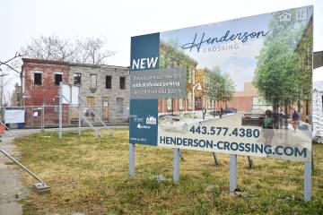 Promo billboard depicts the future design of Henderson Crossing