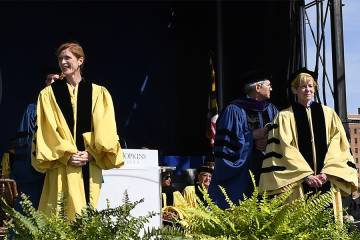 Honorary degree recipients Samantha Power and Jill McGovern on stage at Commencement