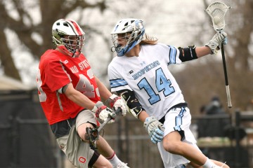 Hopkins player drives against an Ohio State defender