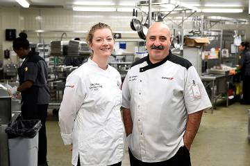 Meg Miller and Petar Stoykov in the Keswick Cafe kitchenMeg Miller and Petar Stoykov are among those who arrive at work each day before sunrise so that breakfast is ready for arriving employees.
