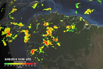 Pockets of intense precipitation in red and yellow are seen over a map of northern South America