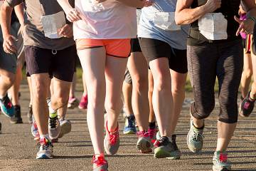 Closeup of runners' legs in a race