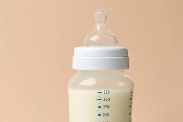 Bottle full of infant formula