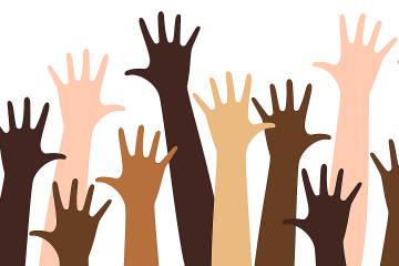 Illustration of raised hands in many different skin tones