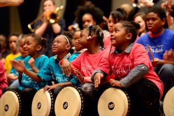 OrchKids play drums at Shriver Hall concert