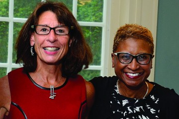 Eleanor Simonsick (left) and Paula Boggs at a reception on Homewood campus last fall