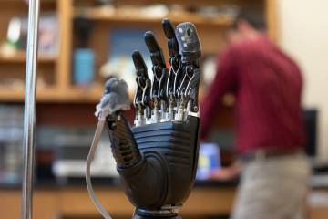 Close-up of prosthetic hand with sensory sleeve on fingertips