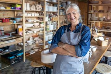 Senior woman in her pottery studio