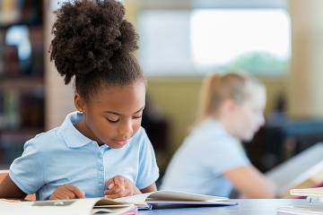 Young girl in a school uniform