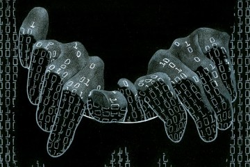 Creepy hands reach out through lines of code
