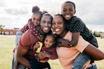 Smiling parents and children