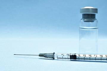Vaccine vile and needle