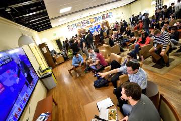 Groups of students watch election returns