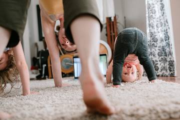 Family doing online home workout class