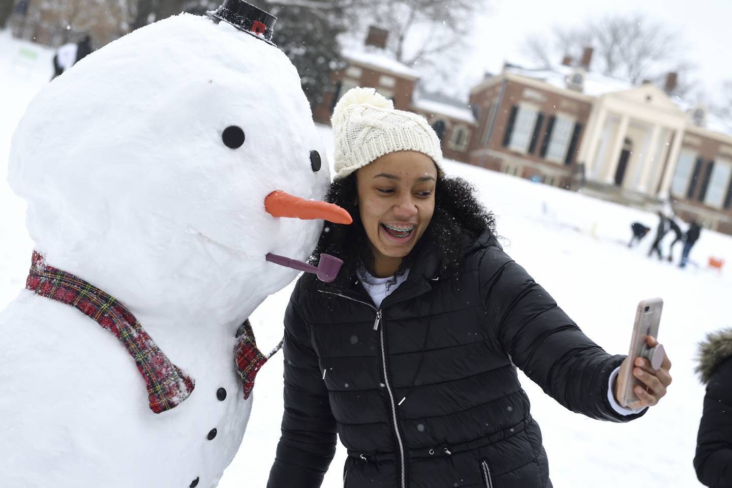 Student makes a snow man