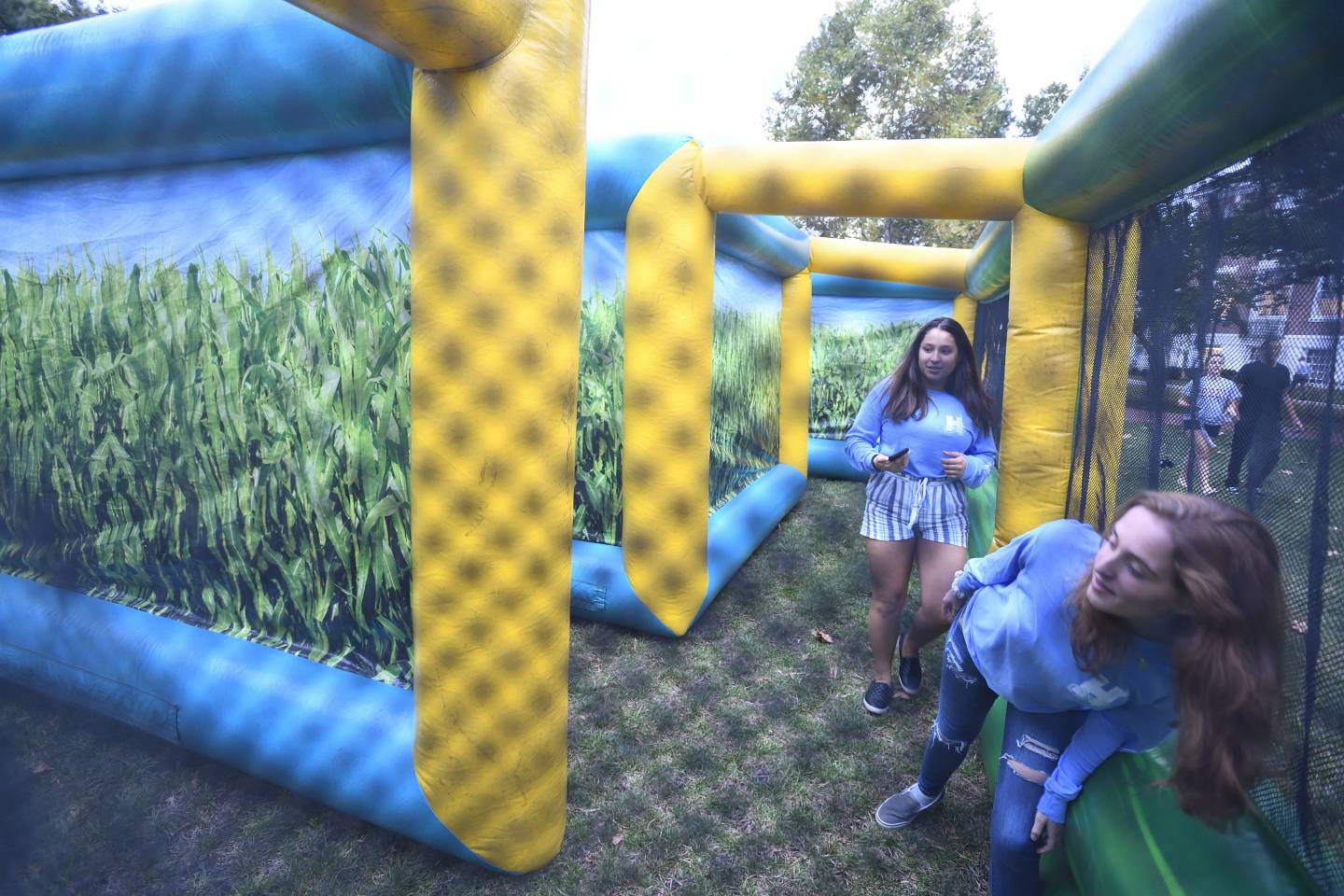 Students get lost in an inflatable corn maze