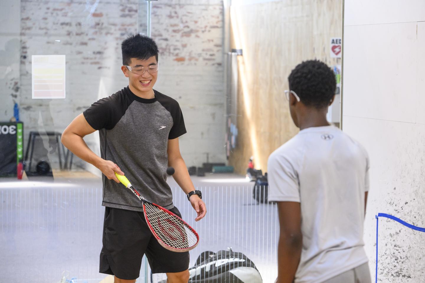 People playing squash