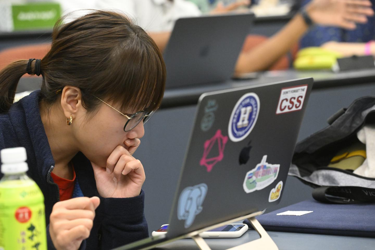 HopHacks student with laptops