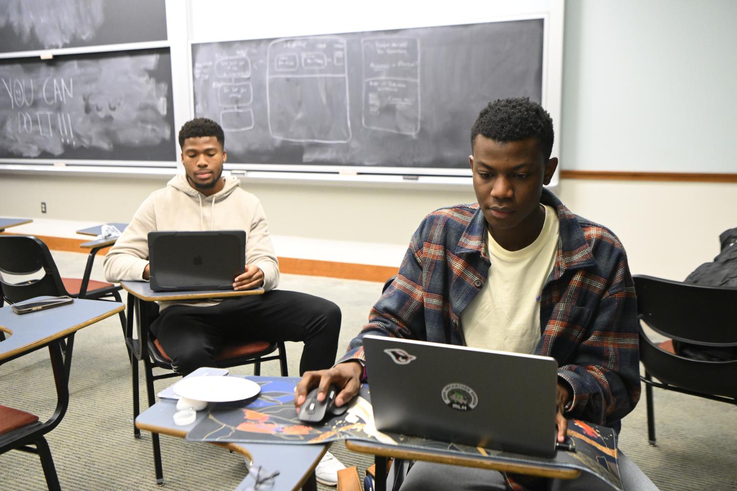 HopHacks students with laptops