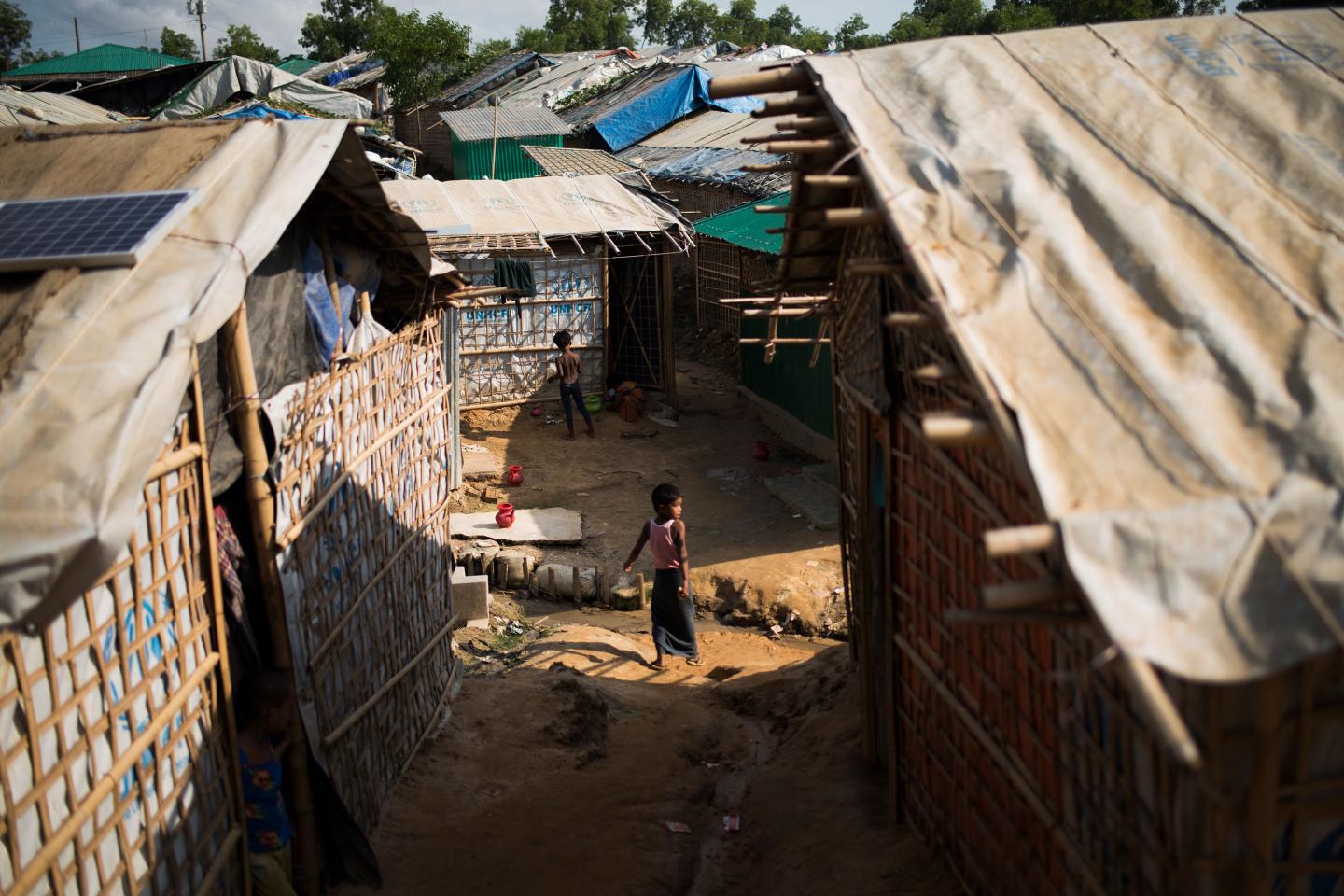 A village of structures appears to be made from bamboo and canvas. Depicted is Bangladesh's Kutupalong camp, the world's largest refugee settlement.