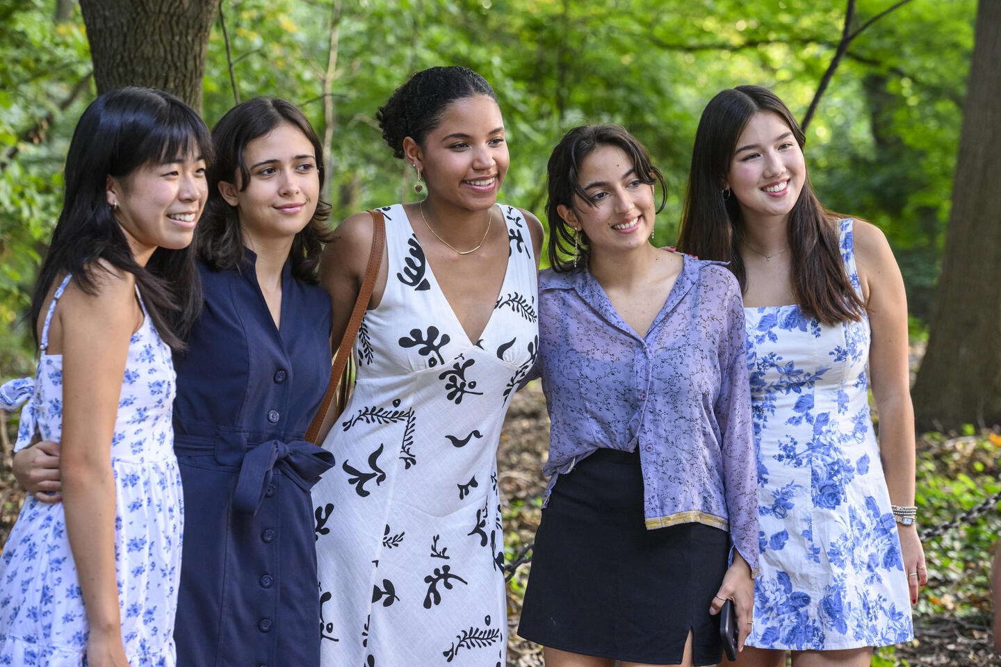 Students pose outdoors for a group photo at Convocation 2024