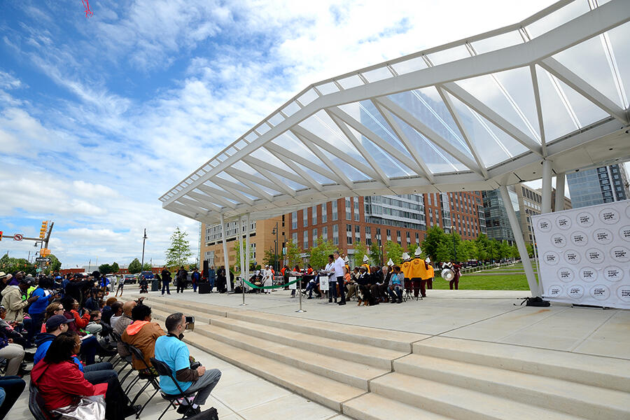 A park amphitheater with a blue sky backdrop