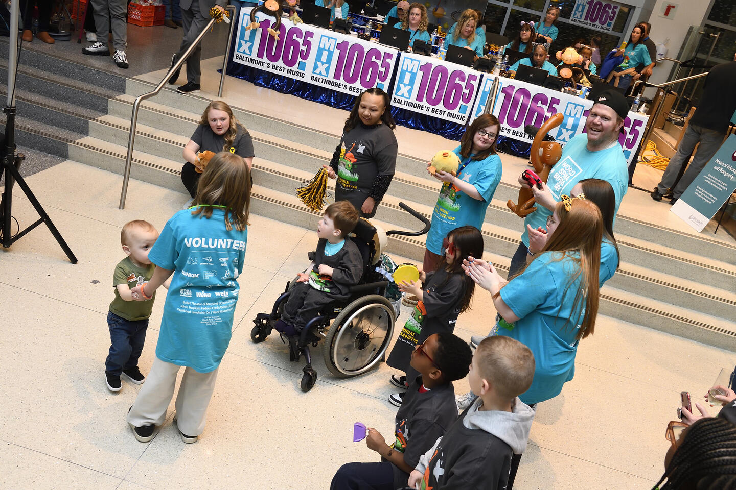 Children cheer at the radiothon