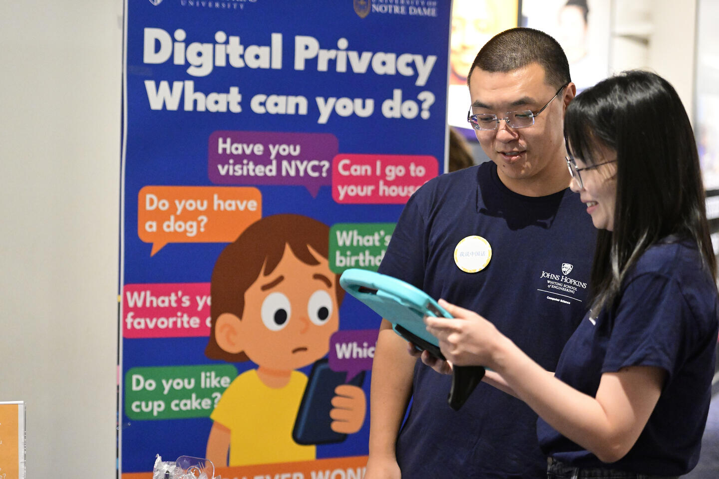 Yaxing Yao, left, and computer science PhD student Lanjing Liu