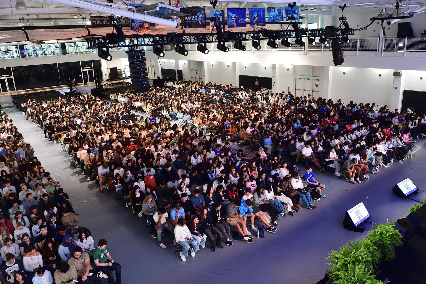 Aerial photo of students seated for Democracy Day opening remarks