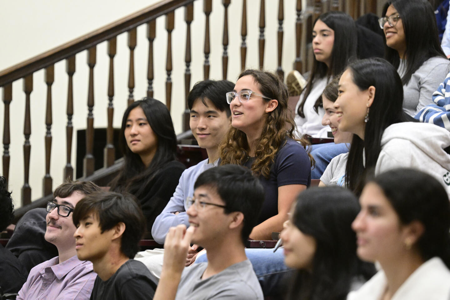 A group of student smile and look engaged during a Democracy Day breakout session